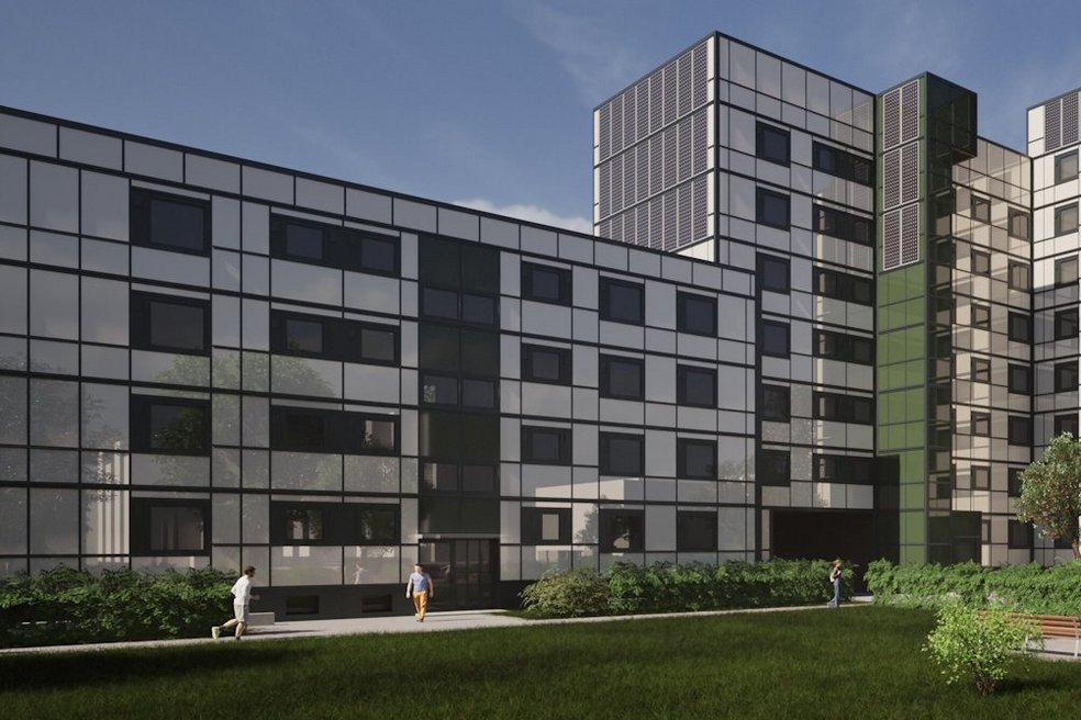 Ansicht Wohnquartier nach Sanierung, Gebäude mit verschiedenen Höhen, davor Grünflächen